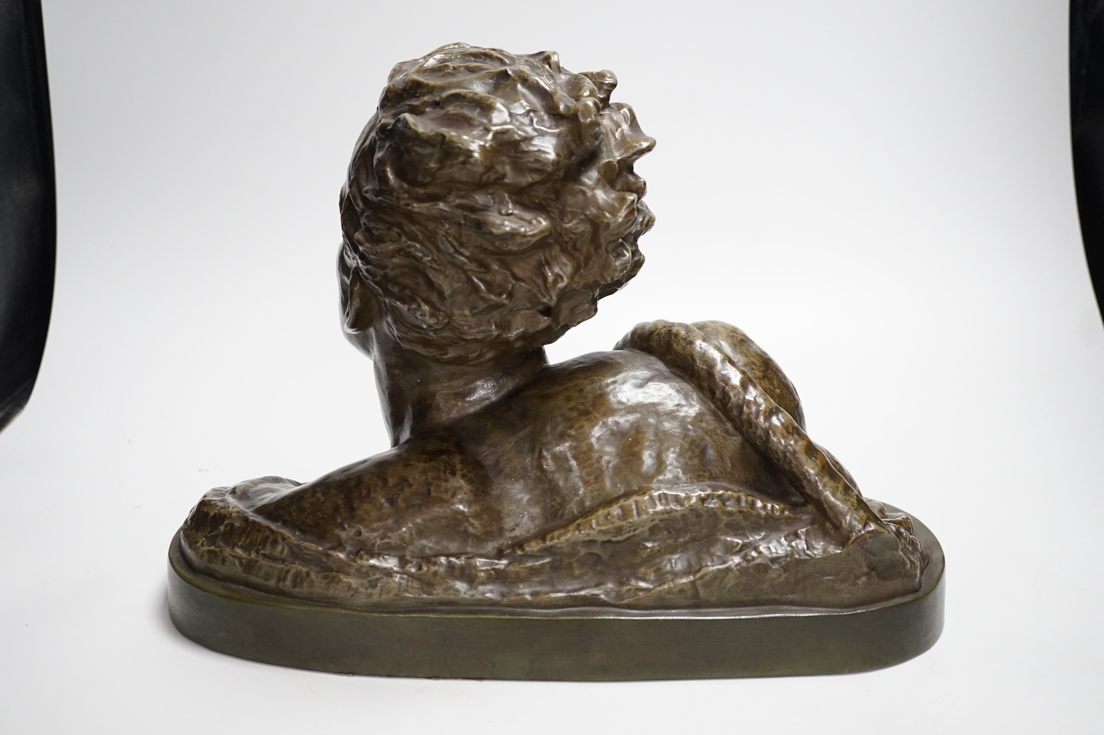 A French Art Deco terracotta bronzed glazed bust, signed Ouline. 27cm tall